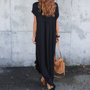 Kjole med V-udskæring, slidser og lommer