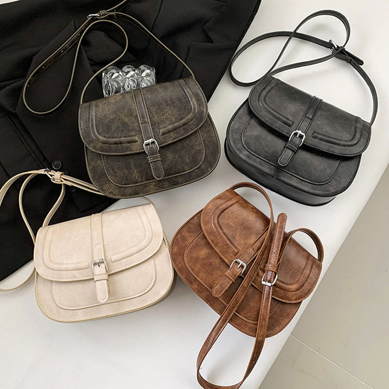 Retro sadelformet crossbody taske