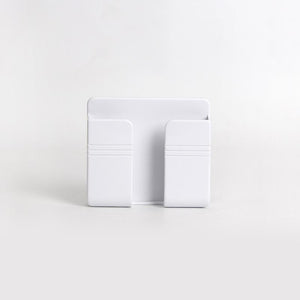 Vægmonteret opladerstander til mobiltelefon