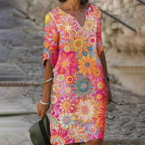 V-halset kjole med halve ærmer