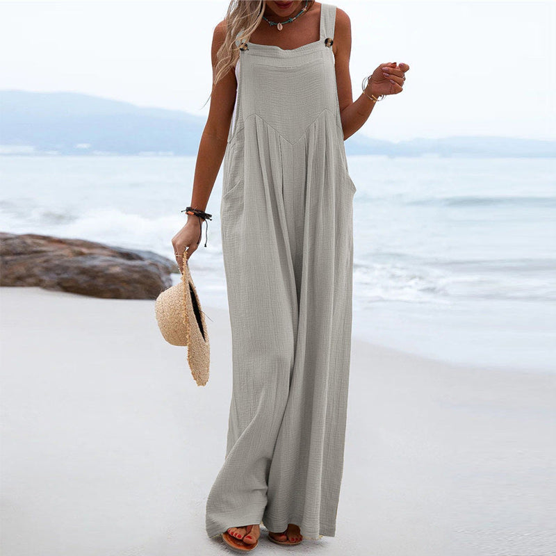 Ensfarvet jumpsuit med brede ben og knapper