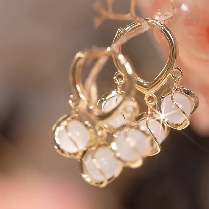 Spiral opal øreringe