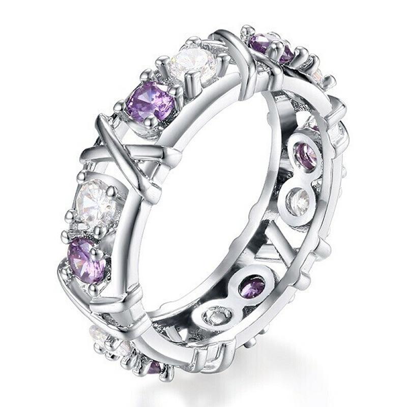 Forgyldt dichroic ring med indlagte zirkonsten