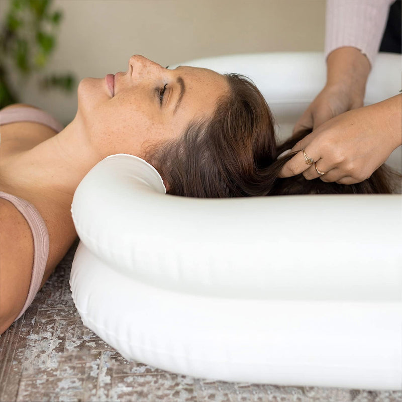 Inflatable shampoo basin with built-in pillow