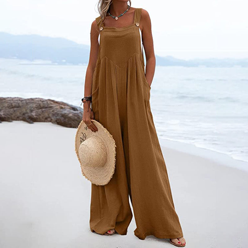 Ensfarvet jumpsuit med brede ben og knapper