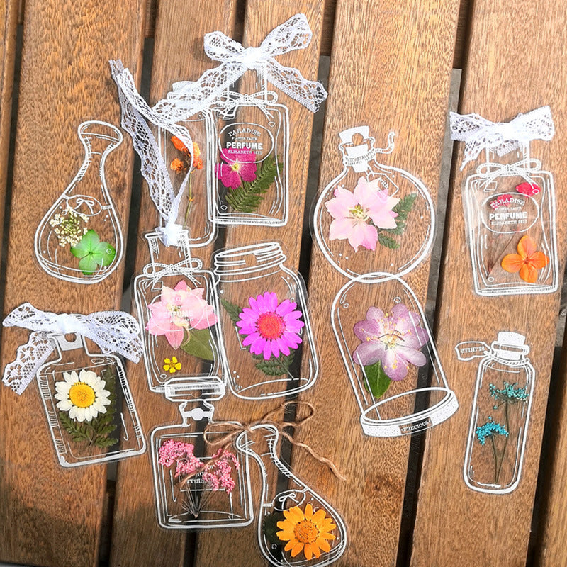 Gennemsigtige tørrede blomster bogmærker