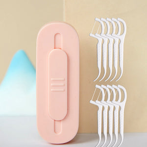 Bærbar to-vejs tandtrådsdispenser