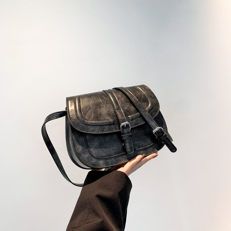 Retro sadelformet crossbody taske