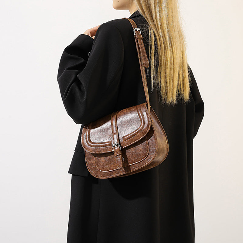 Retro sadelformet crossbody taske