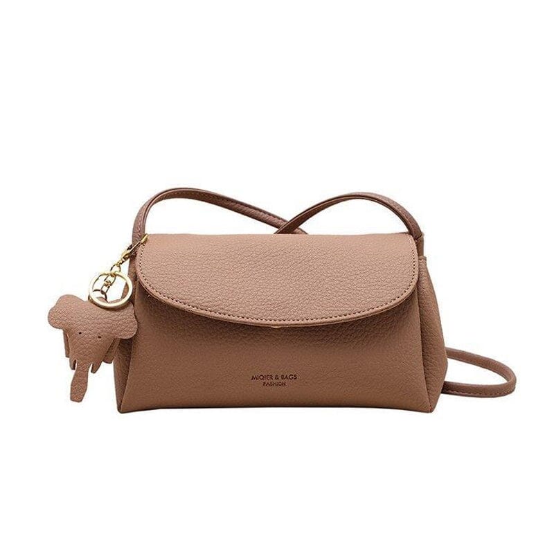 Stilfuld crossbody-taske med elefantvedhæng