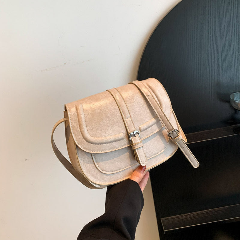 Retro sadelformet crossbody taske