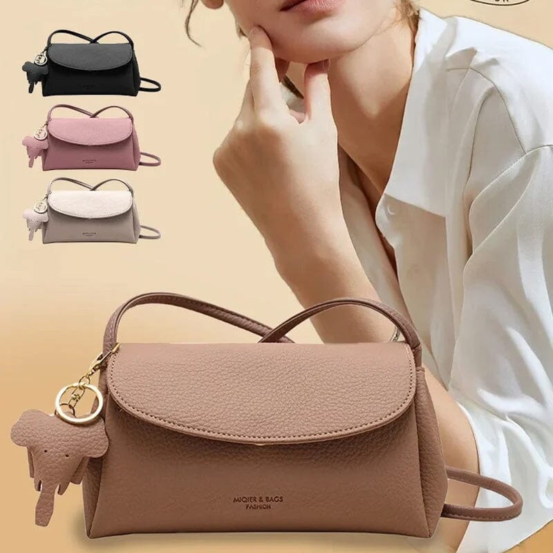 Stilfuld crossbody-taske med elefantvedhæng