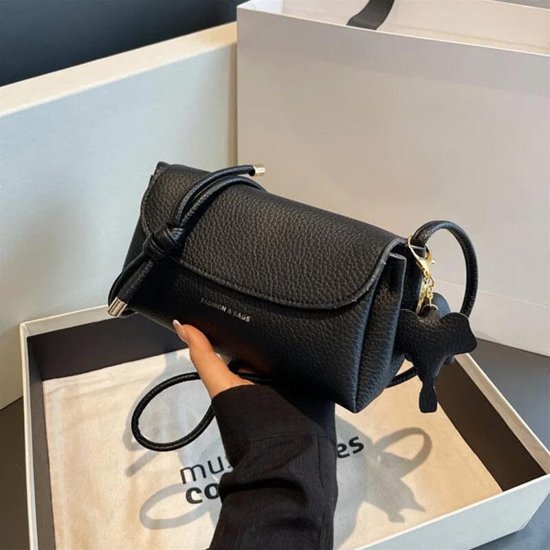 Stilfuld crossbody-taske med elefantvedhæng